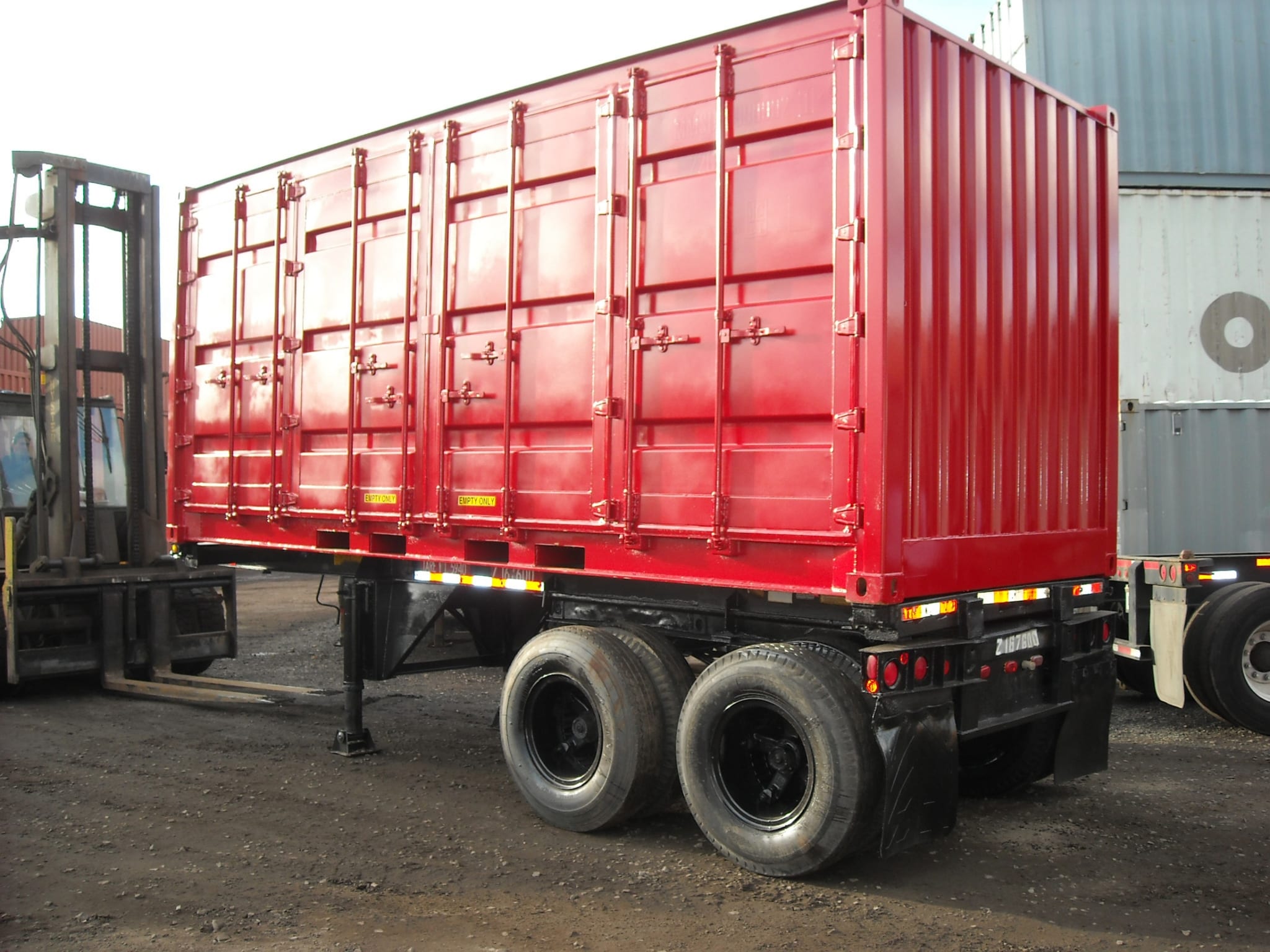 TRS Containers sells new one-trip ISO openside containers that fit on ISO container chassis