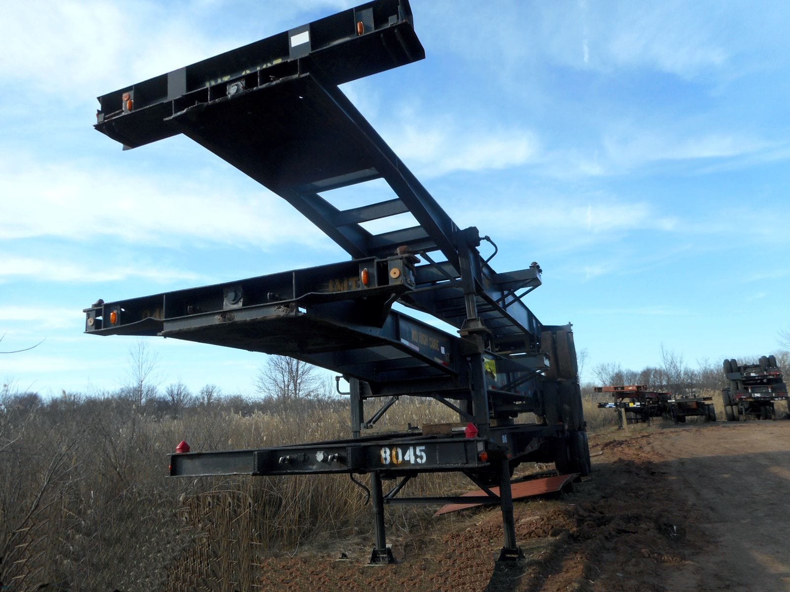 TRS Containers sells rents repairs registers stacks store delivers container chassis